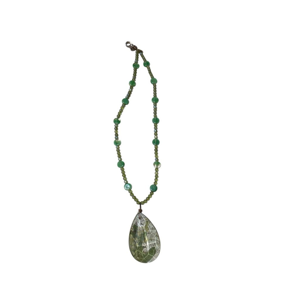 Like pastel greenish crystal textured artful floral pendant necklace!!!